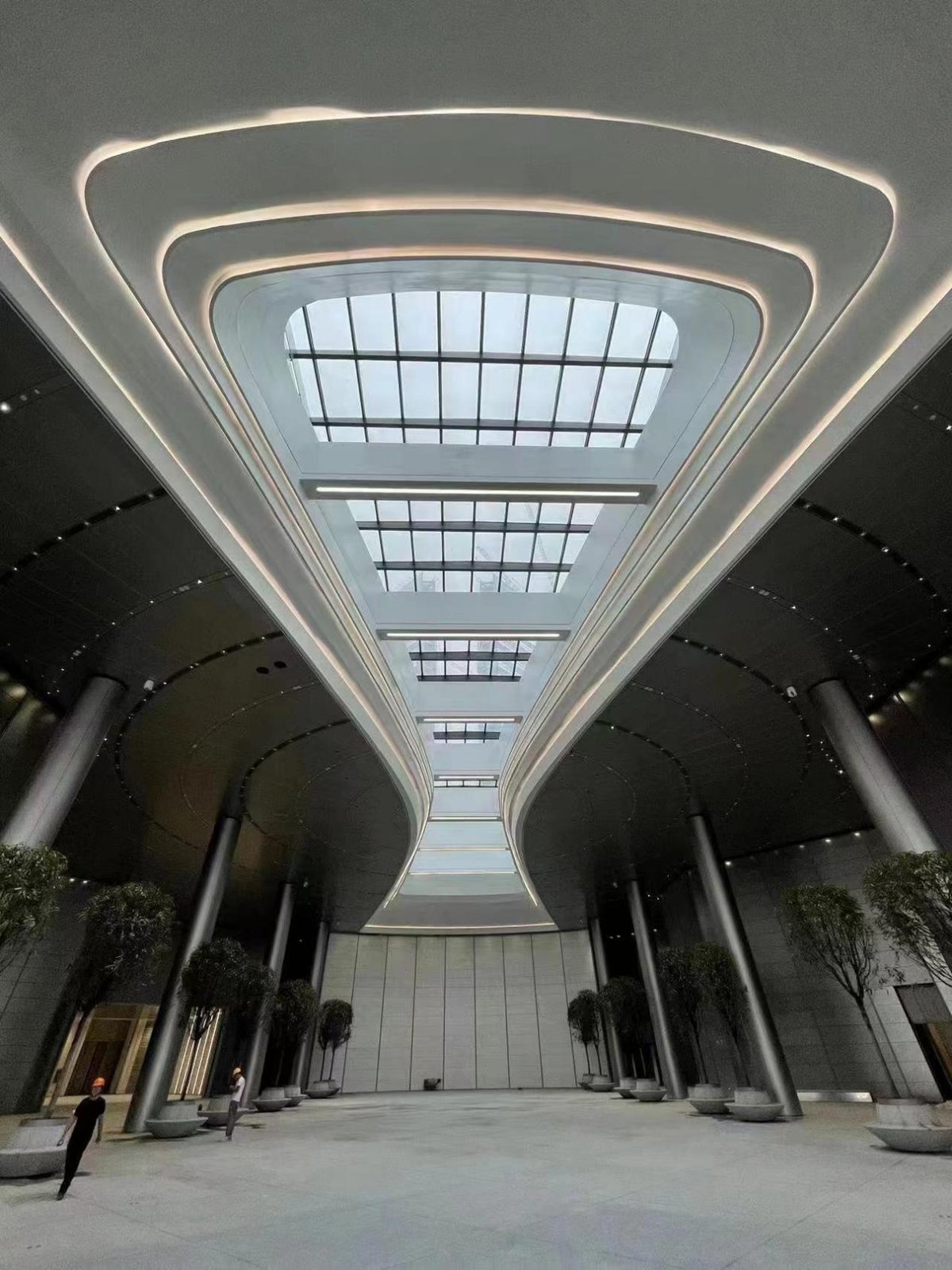 Atrium skylight with photovoltaic glass
